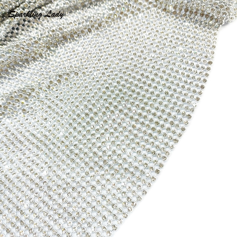 قماش معدني مرصع بالأحجار الكري - مراجعة Crystal Mesh Fabric وسعره